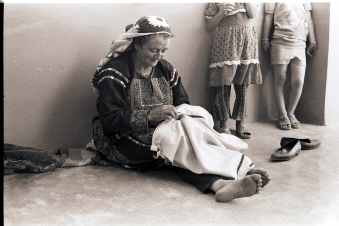 Fatima Yousef Sewing a Palestinian Thobe